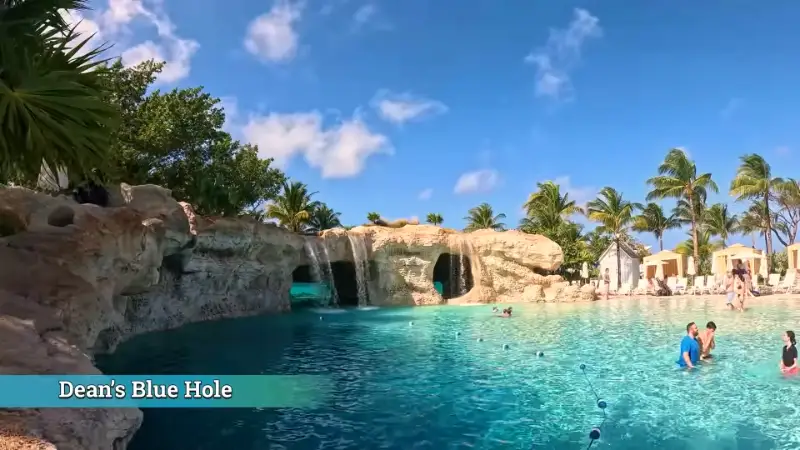 Resort swimming pool designed to resemble Dean's Blue Hole with rock features